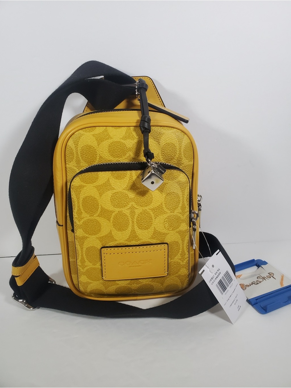 NWT Coach men Racer Sling Pack Signature Canvas Charms Limited edition